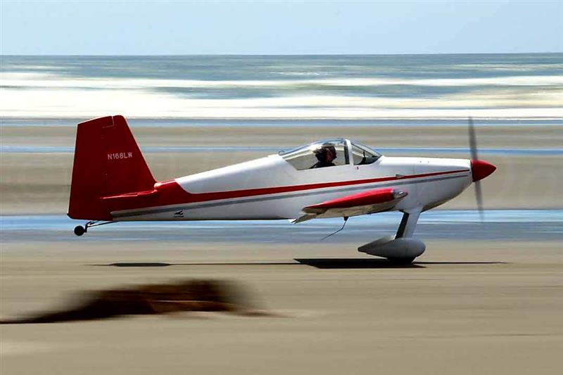 RV7 taking off from beach airport